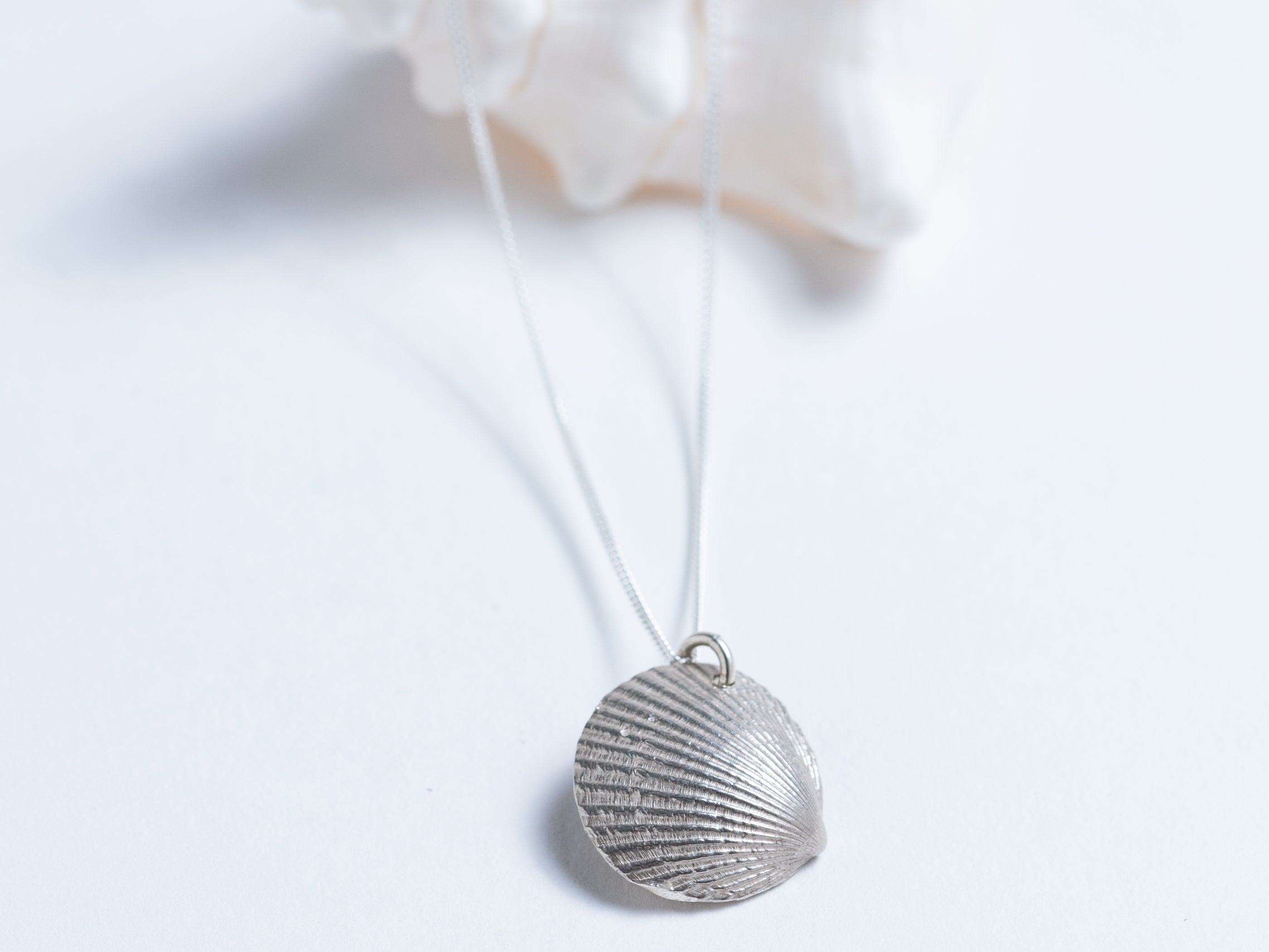Cast Shell with Pearl Pendant